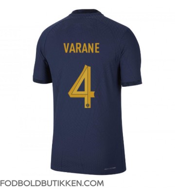 Frankrig Raphael Varane #4 Hjemmebanetrøje VM 2022 Kortærmet